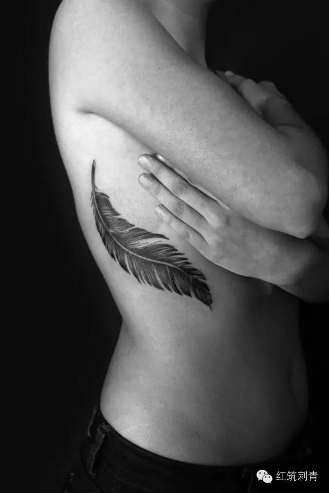 Feather Tattoo On Right Rib Cage