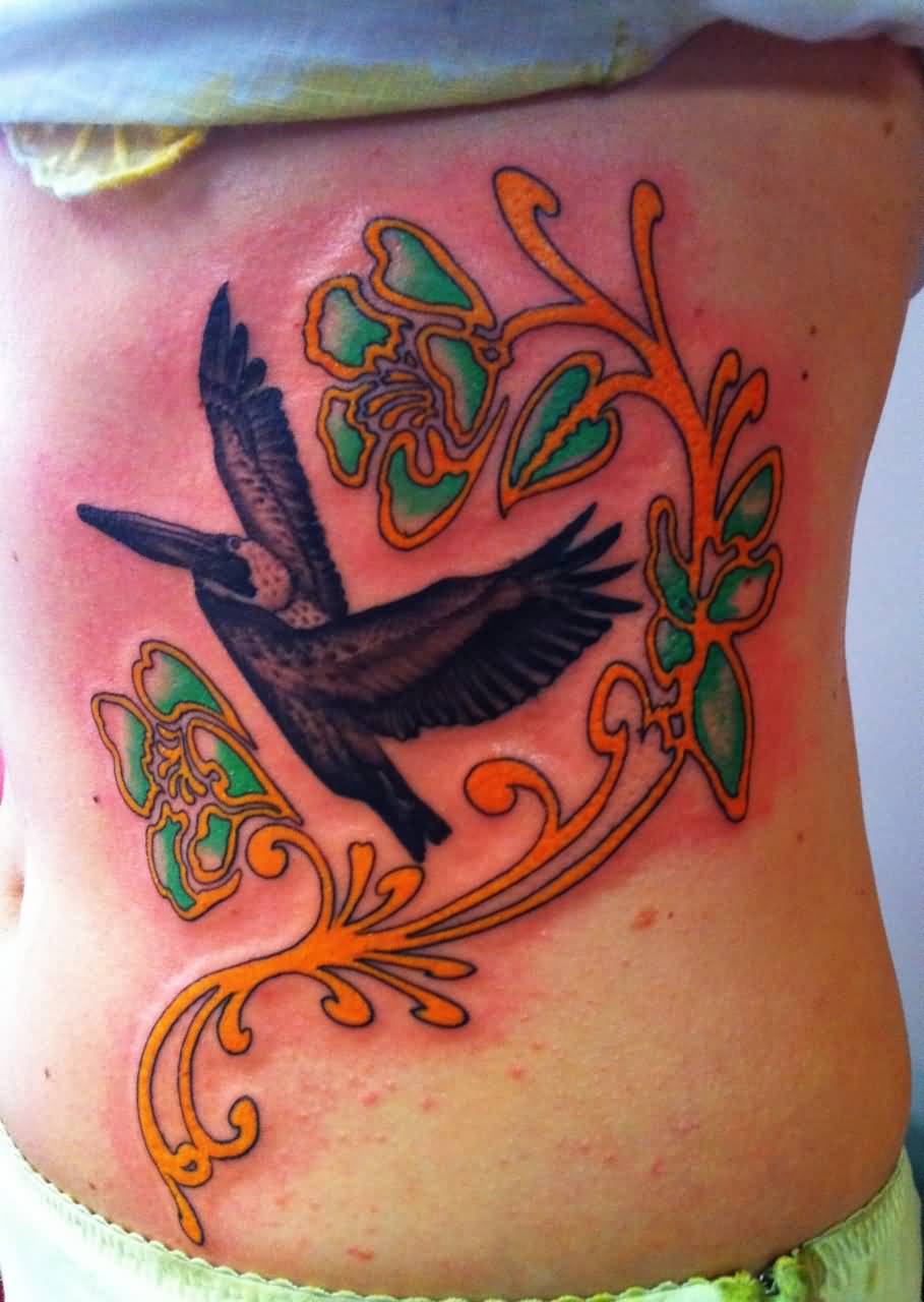 Flying Hummingbird Tattoo On Side Rib by Ami James