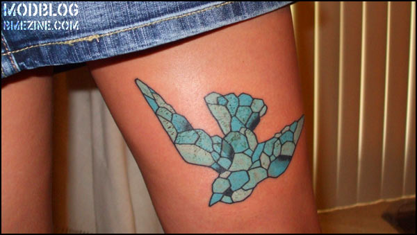 Flying Stained Glass Bird Tattoo On Thigh