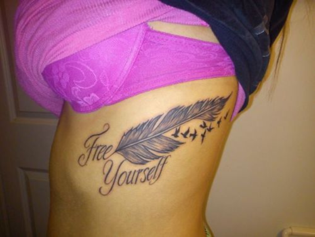 Free Yourself Feather With Birds Tattoo On Rib Cage