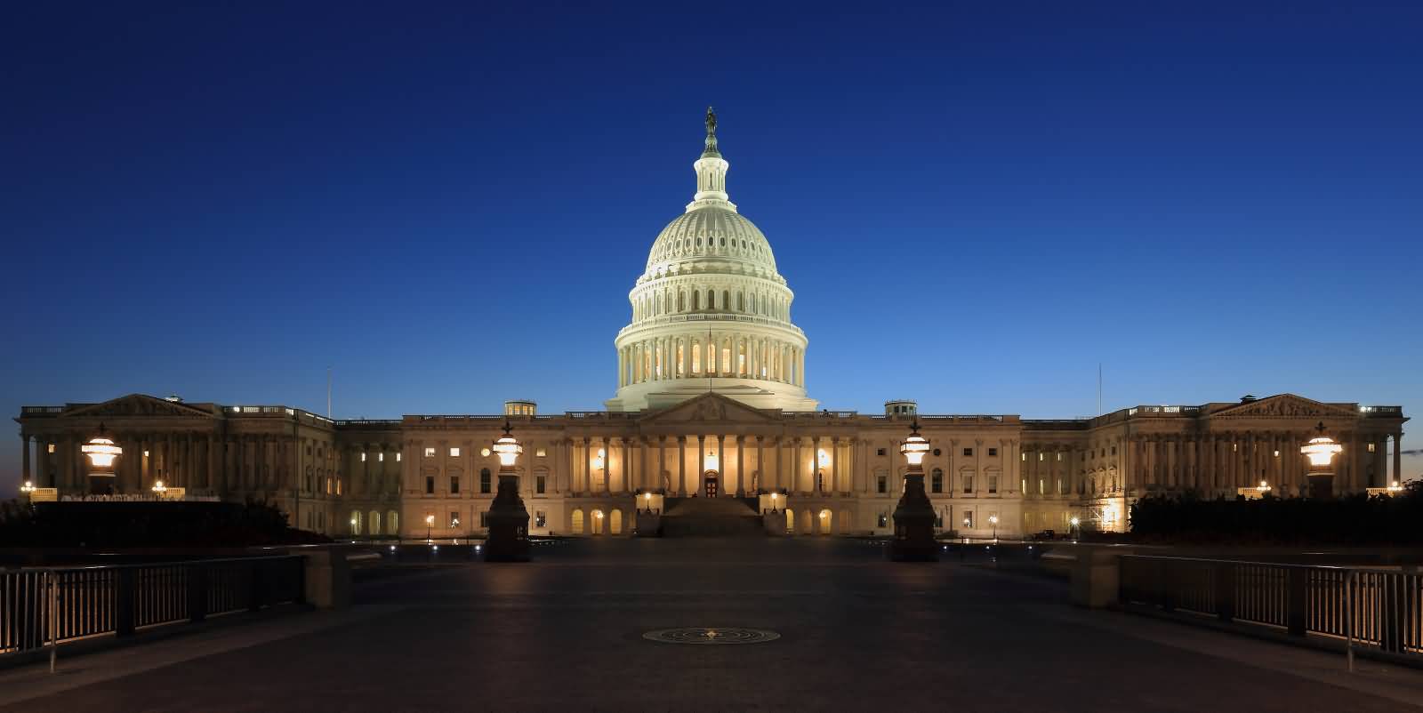 Front View Of United States Capitol At Night