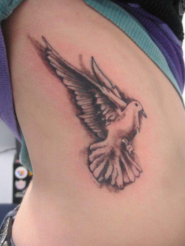 Grey Ink Bird Tattoo On Rib Cage