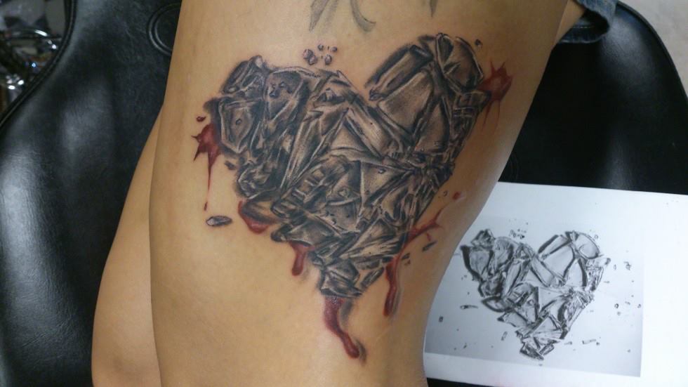 Grey Ink Broken Glass Heart Tattoo On Thigh