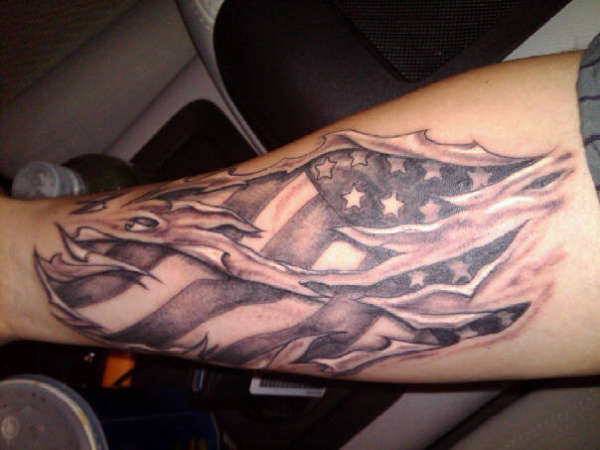 Grey Ink Ripped Skin US Flag Tattoo On Forearm