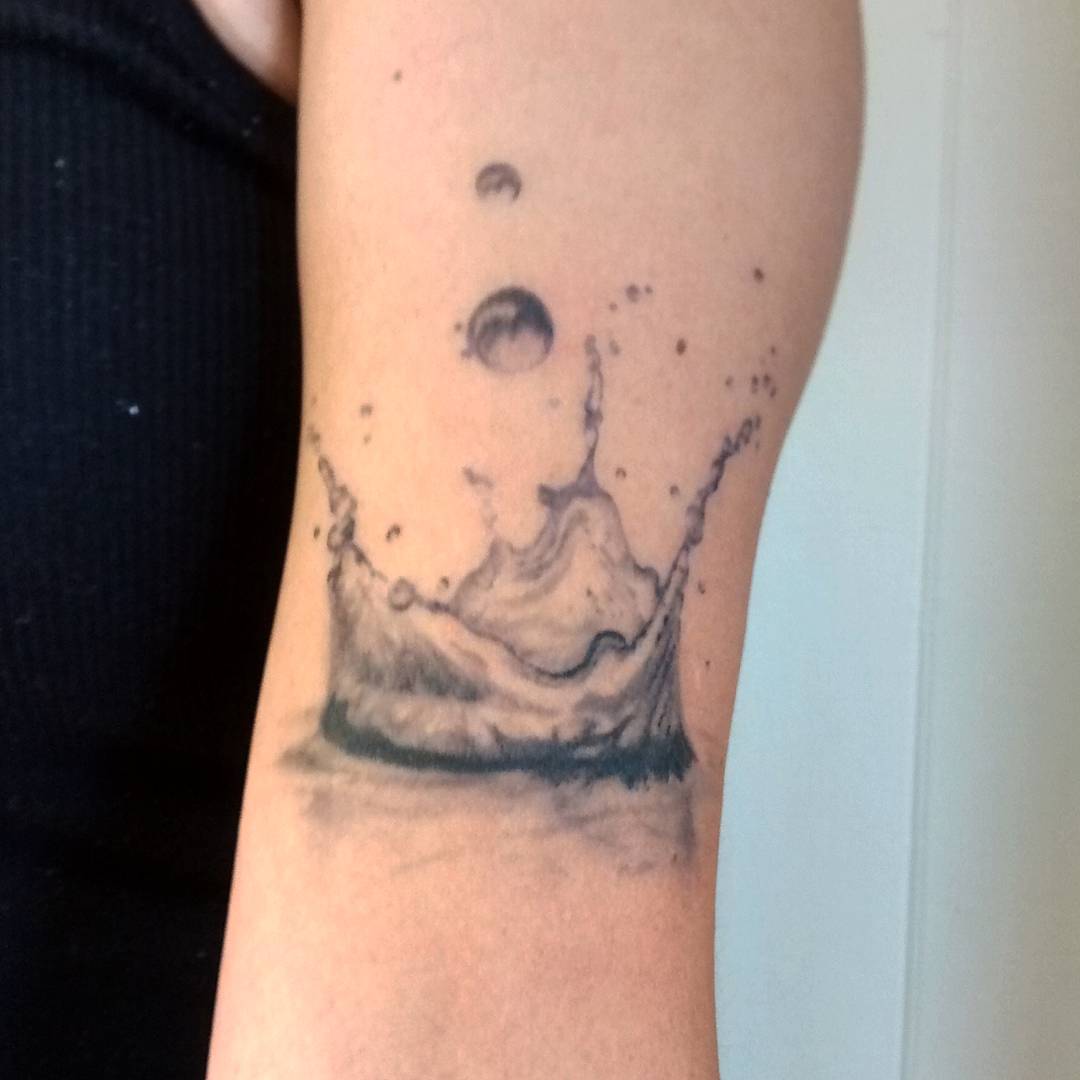 Grey Water Droplet Tattoo On Triceps