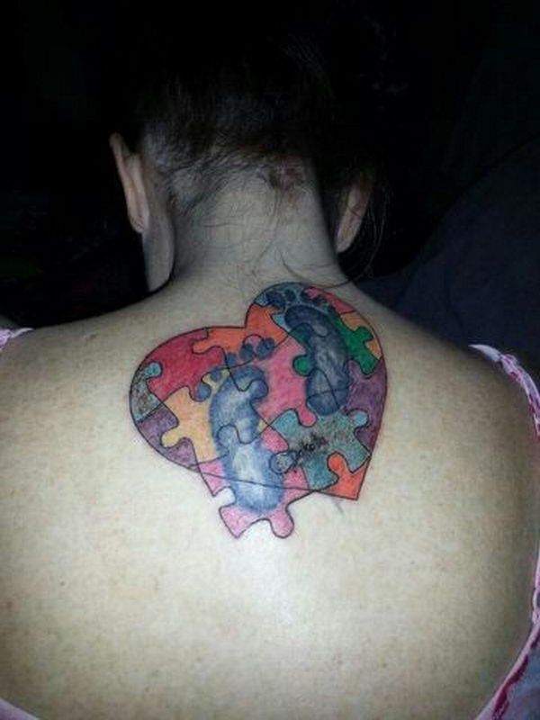 Heart Puzzle Baby Footprints Tattoo On Upper Back For Girls