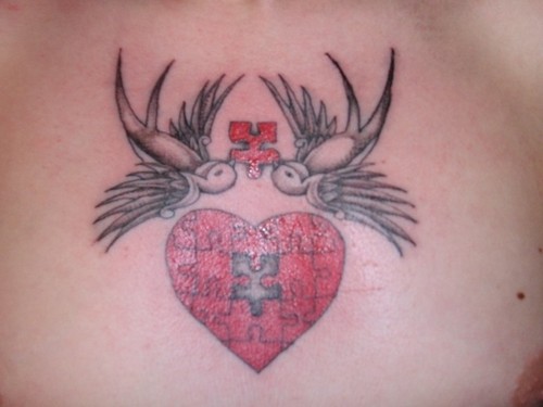 Heart Puzzle With Sparrows Tattoo On Chest