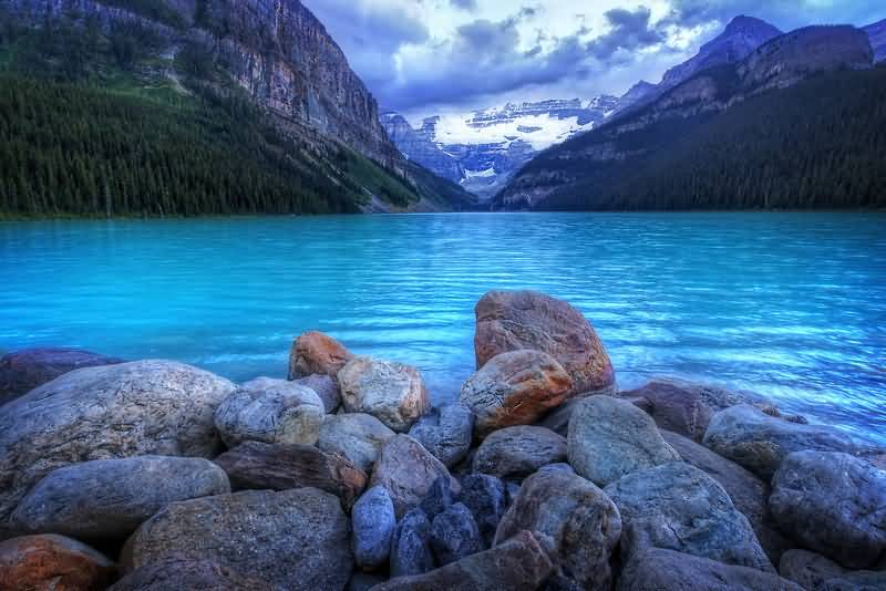 Icy Blue Water Of Lake Louise In Alberta, Canada
