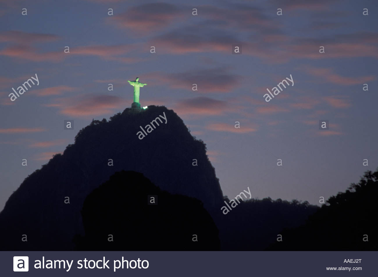 Illuminated Christ the Redeemer Statue On Corcovado Mountain At Night