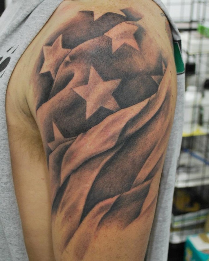 Impressive Black US Flag Tattoo On Left Shoulder