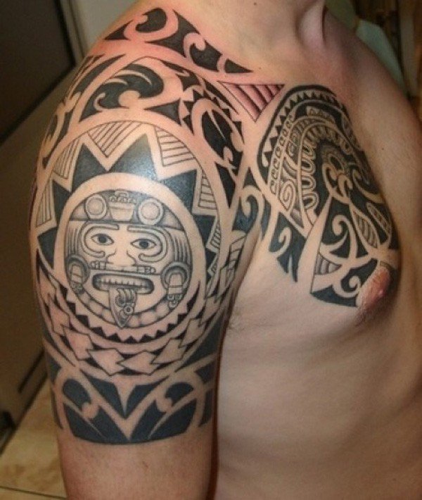Impressive Maori Tribal Tattoo On Arm And Shoulder