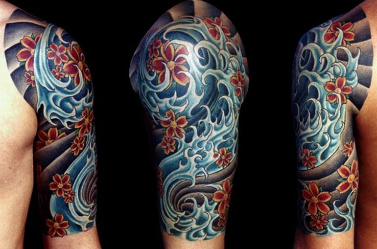 Japanese Water Waves With Flowers Tattoo On Half Sleeve