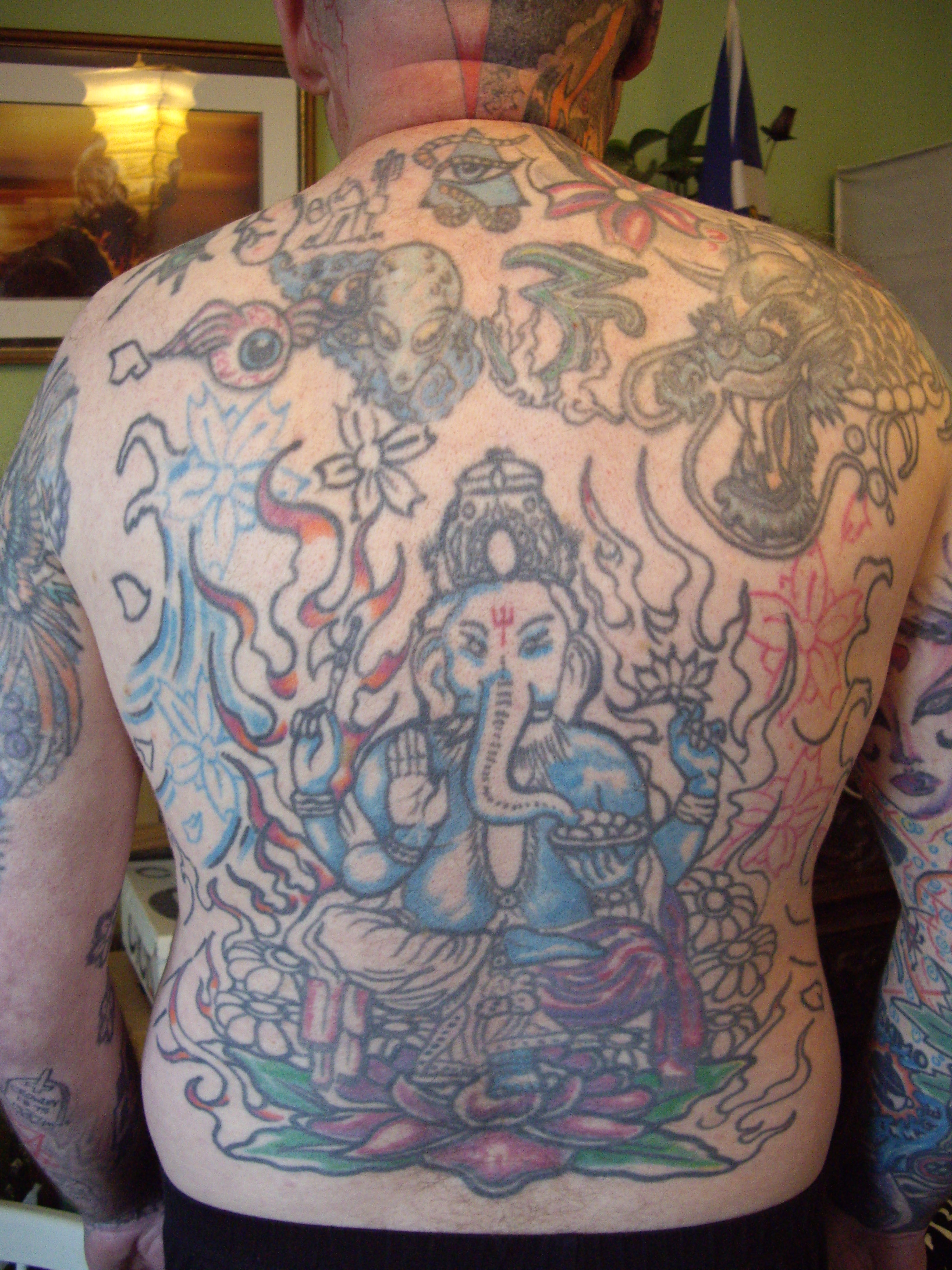 Lotus Flower And Ganesha Tattoo On Full Back
