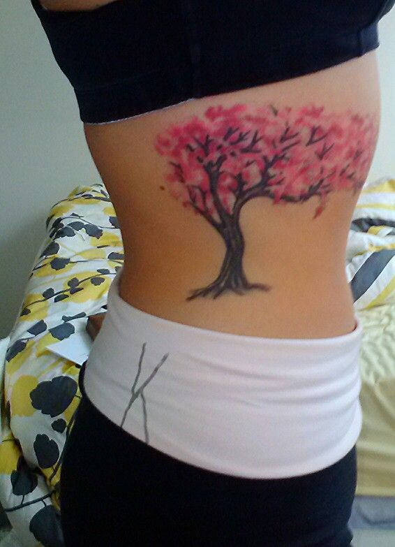 Lovely Cherry Blossom Tree Tattoo On Rib Cage By Exotic Body Works