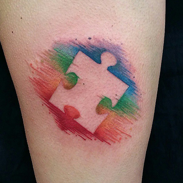 Lovely Colorful Puzzle Piece Tattoo