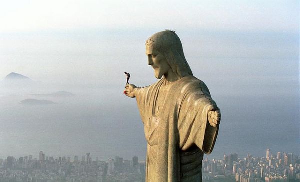 Man On The Hand Of Christ The Redeemer Statue