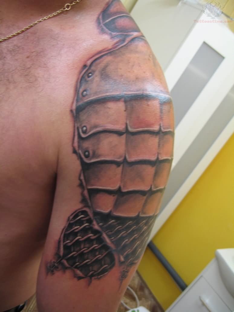 Medieval Armor Ripped Skin Tattoo On Left Shoulder
