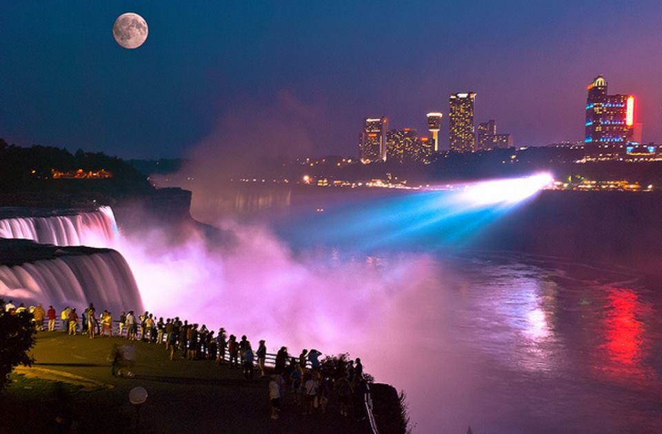 Niagara Falls Illuminated At Night With Full Moon