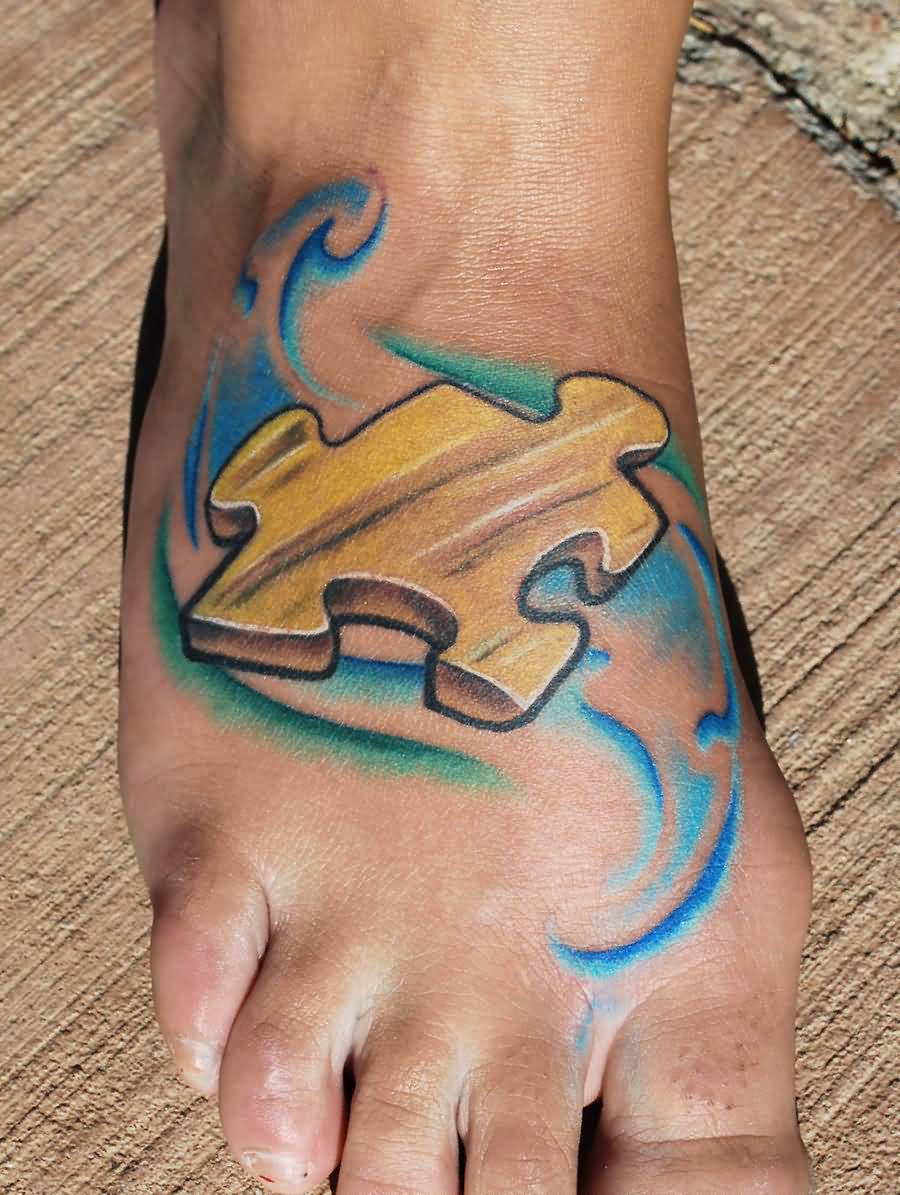 Nice Colored Puzzle Piece Foot Tattoo By Joshing88