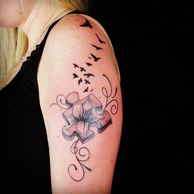 Nice Puzzle Birds And Flower Tattoo On Left Half Sleeve