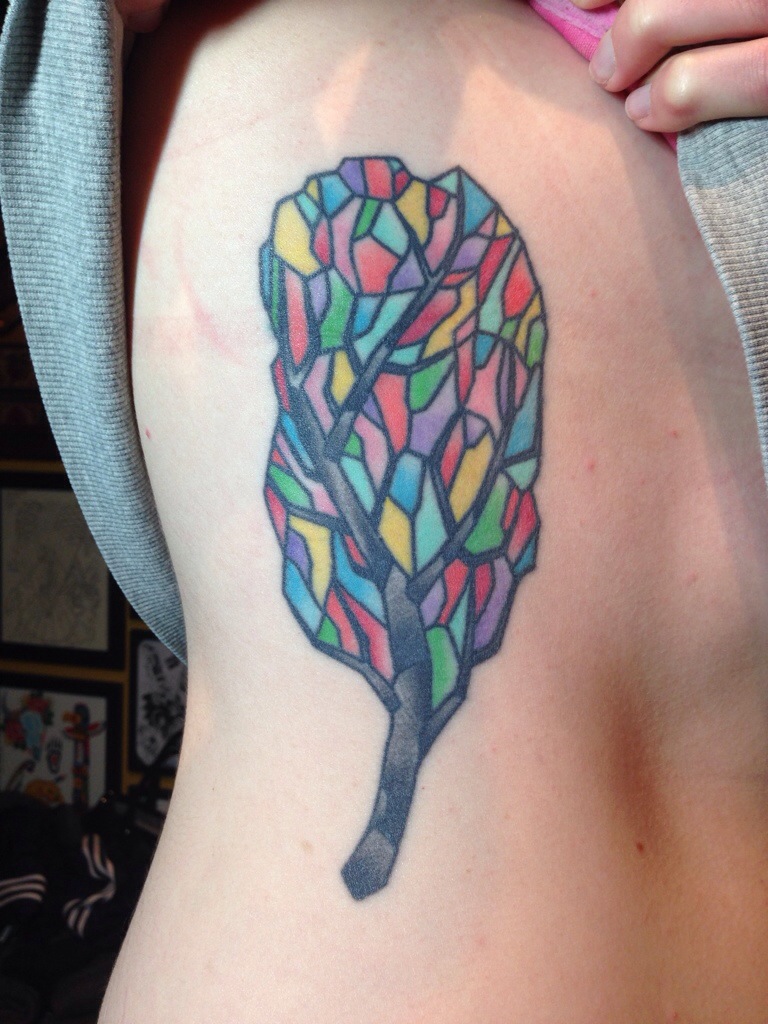 Nice Stained Glass Tree Tattoo On Side Rib