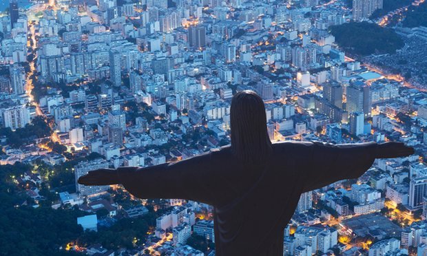 Night View Of The Christ The Redeemer Statue And Rio de Janeiro City