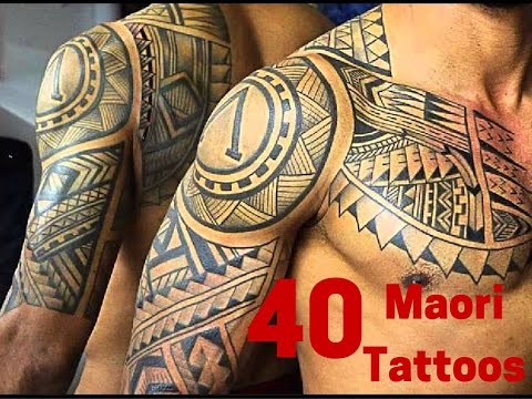 Outstanding Maori Tattoo On Man Chest And Sleeve