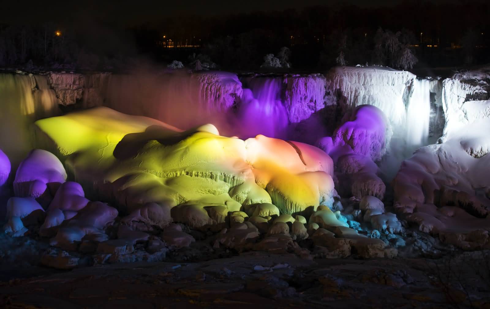 Partially Frozen Niagara Falls Seen On The American Side With Night Lights