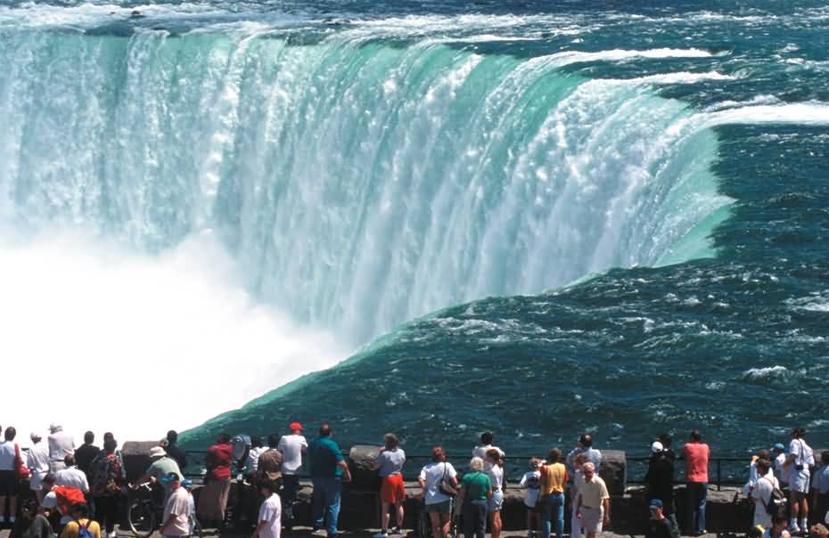 People Enjoying The View Of Niagara Falls