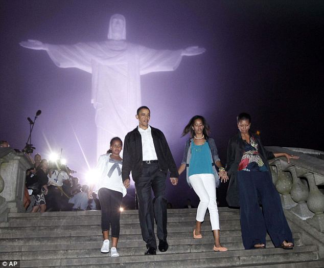 President Barack Obama With Family At The Christ the Redeemer At Night