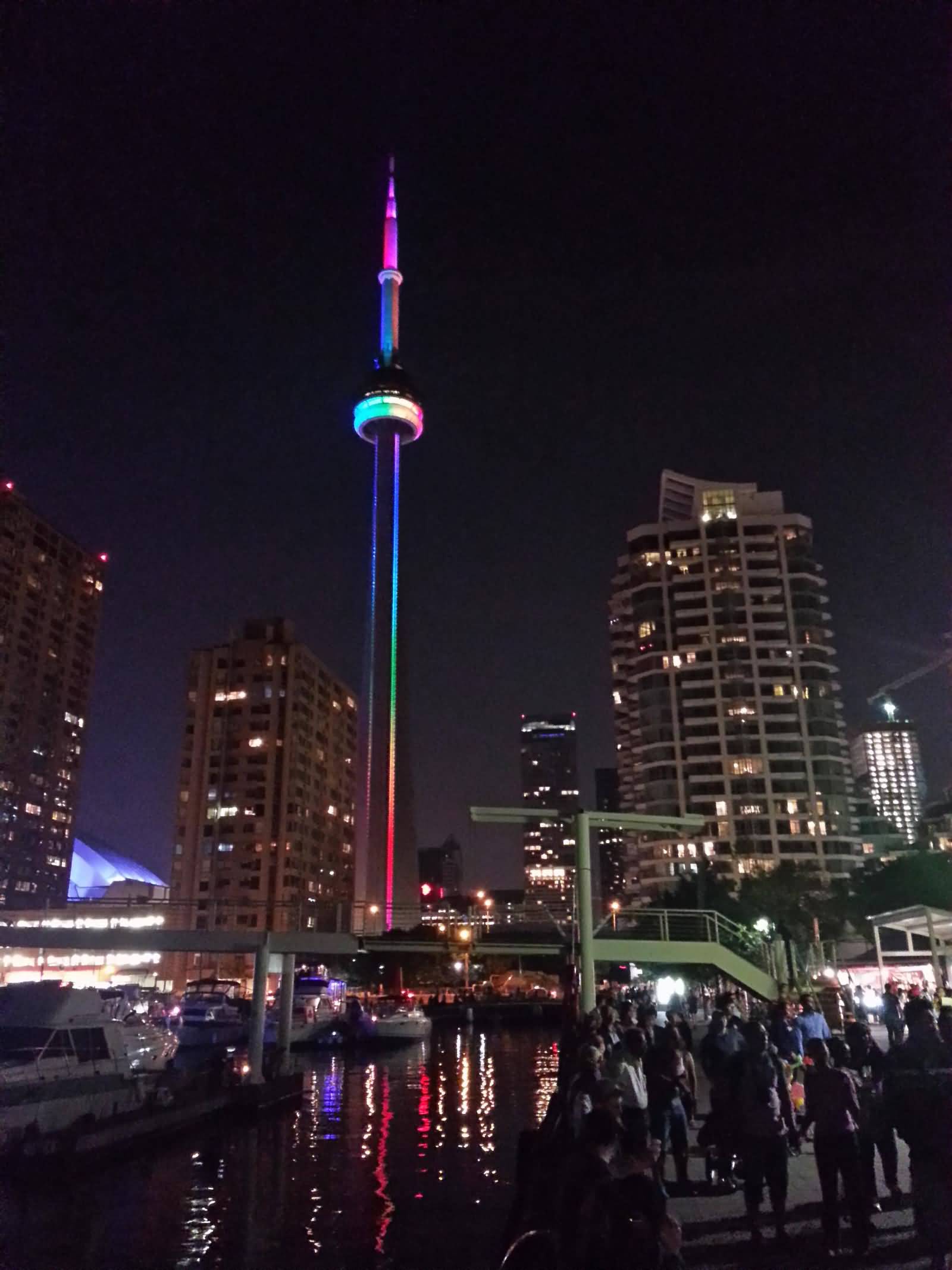 Rainbow Lights On The CN Tower At Night