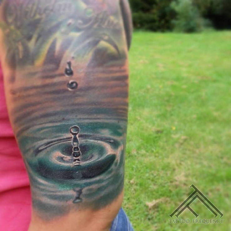Realistic Water Drop Tattoo On Sleeve
