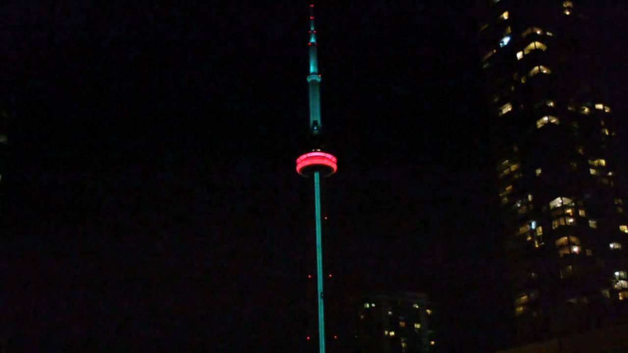 Red And Green LED Light Show On CN Tower At Night