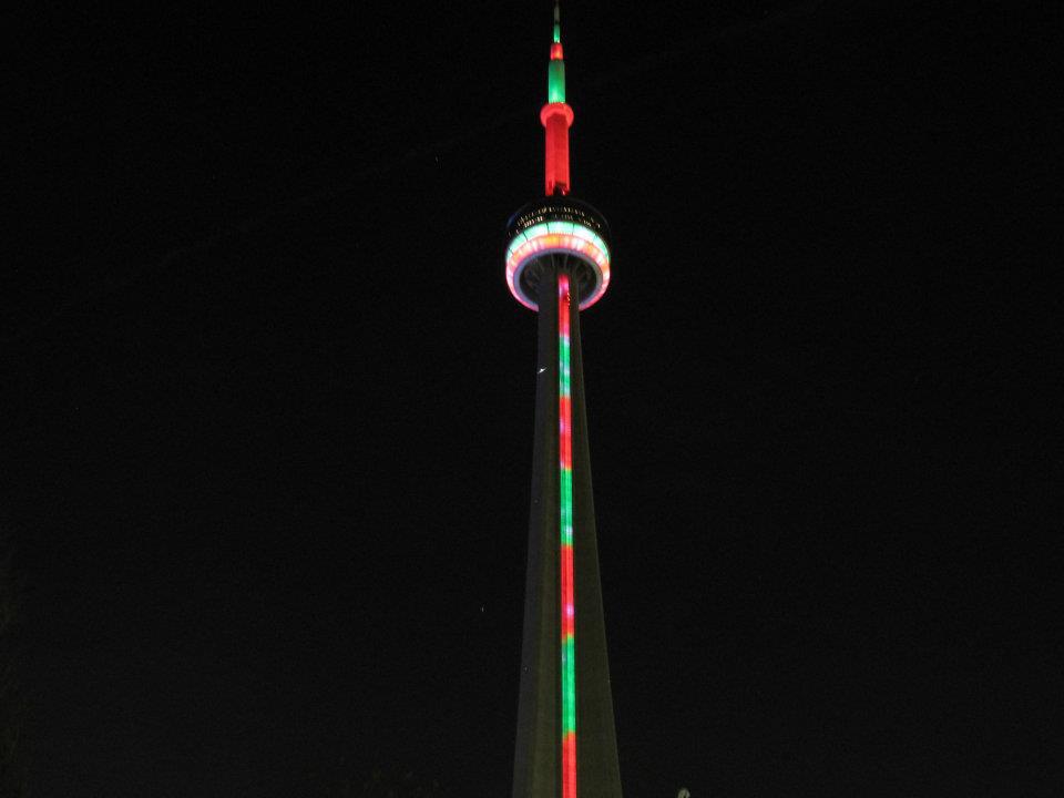 Red And Green Lights On CN Tower During Night
