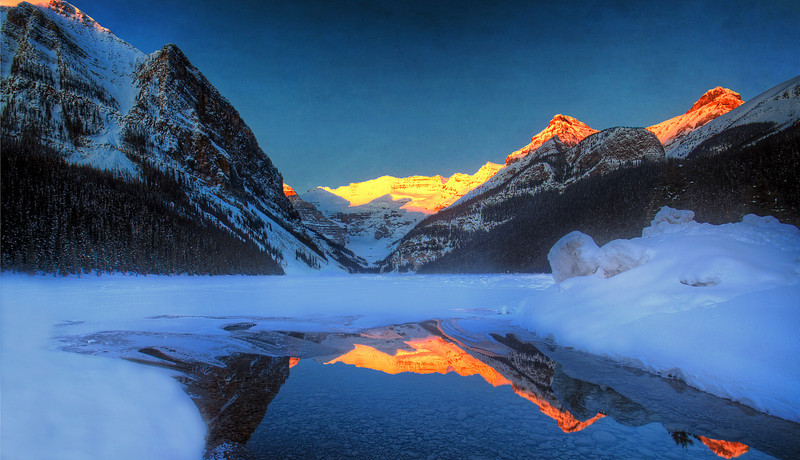 Reflection Of Volcano In Lake Louise