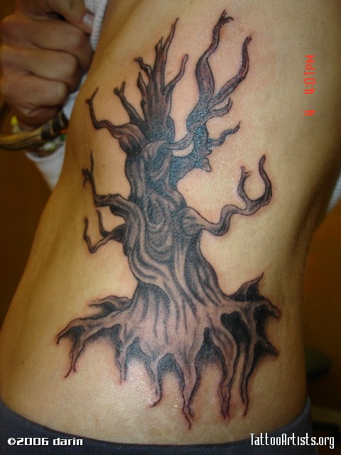 Rib Cage Twisted Tree Tattoo