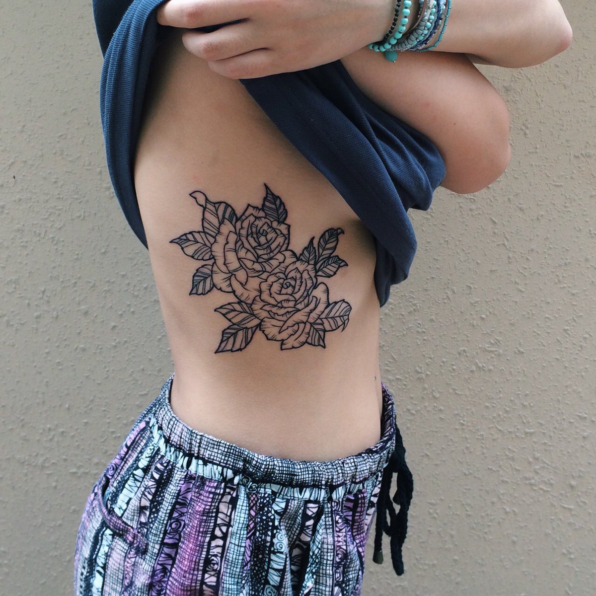 Rose Flowers Rib Cage Tattoo For Girls.