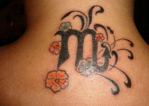 Scorpio Symbol With Flowers Tattoo On Upper Back