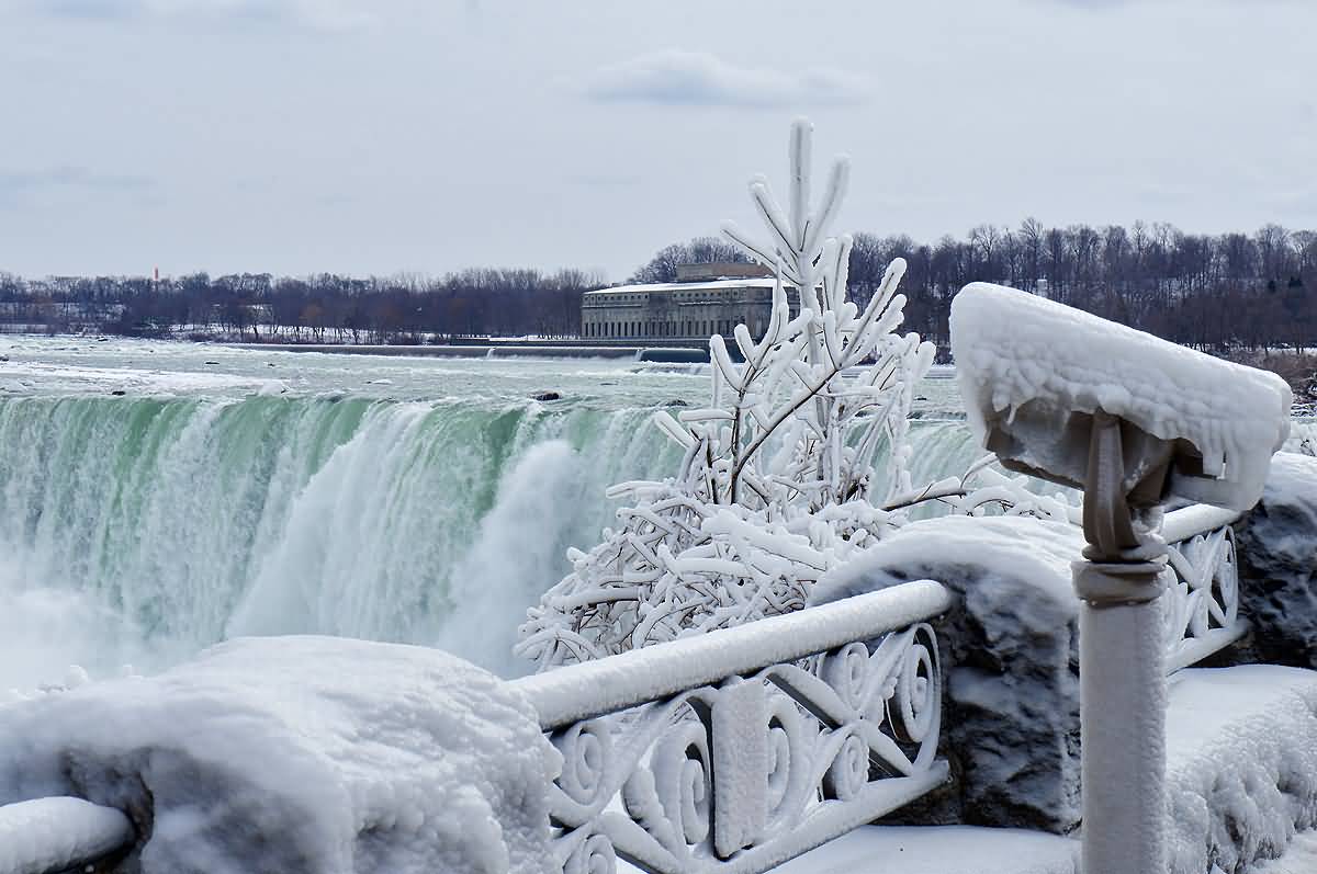 Side View Of Frozen Niagara Falls During Winter