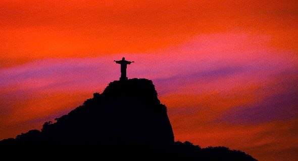 Silhouette View Of Christ The Redeemer During Sunset