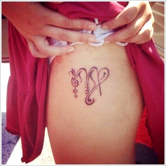 Simple Scorpio Tattoo On Girl Thigh