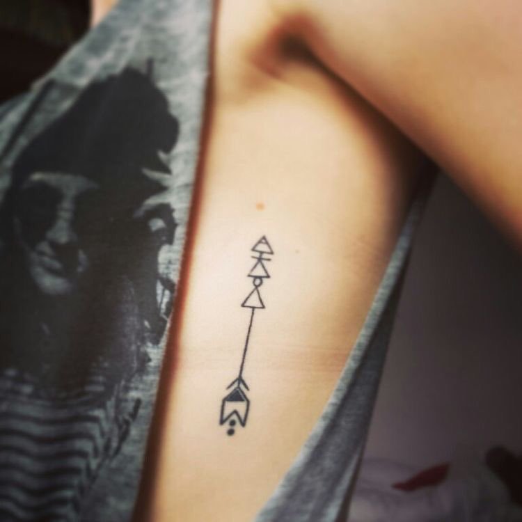 Small Arrow Tattoo On Rib Cage