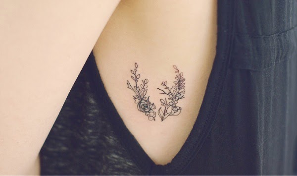 Small Flowers Rib Cage Tattoo