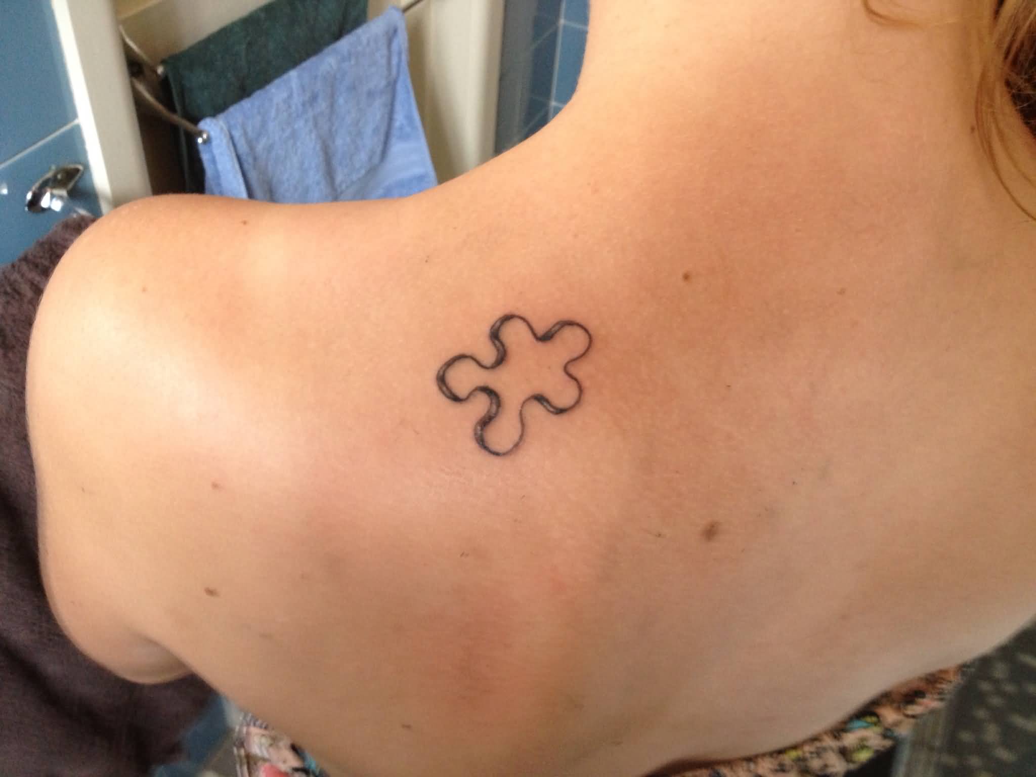 Small Puzzle Piece Outline Tattoo For Girls