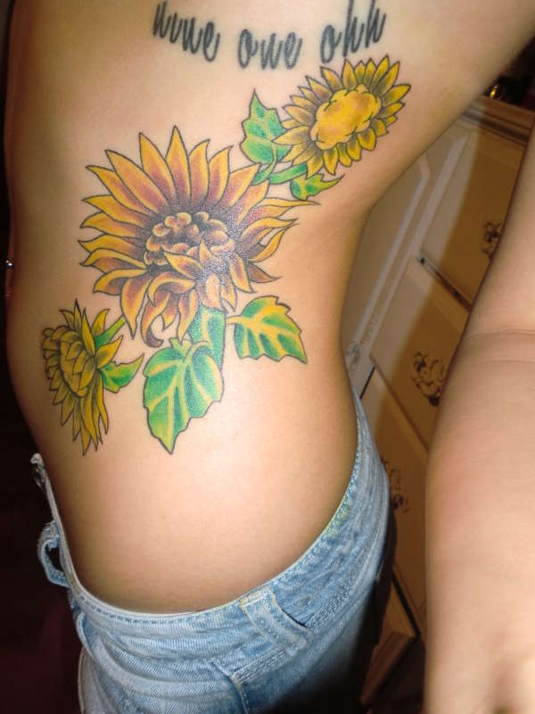 Sunflowers Rib Cage Tattoo For Men