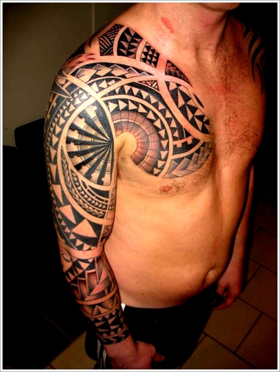 Superb Maori Tattoo On Arm And Chest