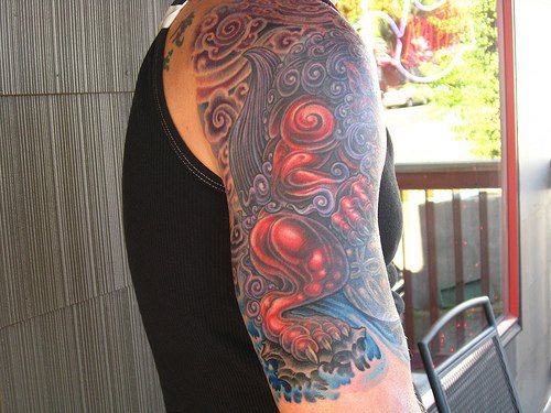 Superb Water Monster Tattoo On Right Half Sleeve