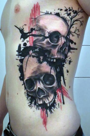 Terrific Skulls Rib Cage Tattoo