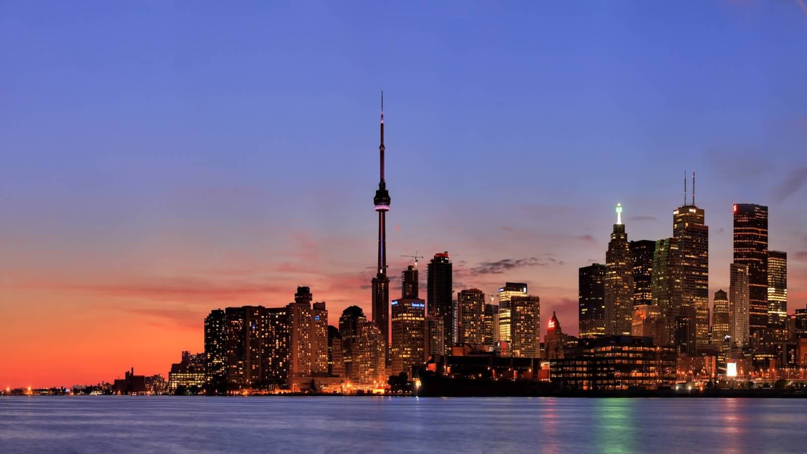 The CN Tower And Toronto Skyline During Sunset