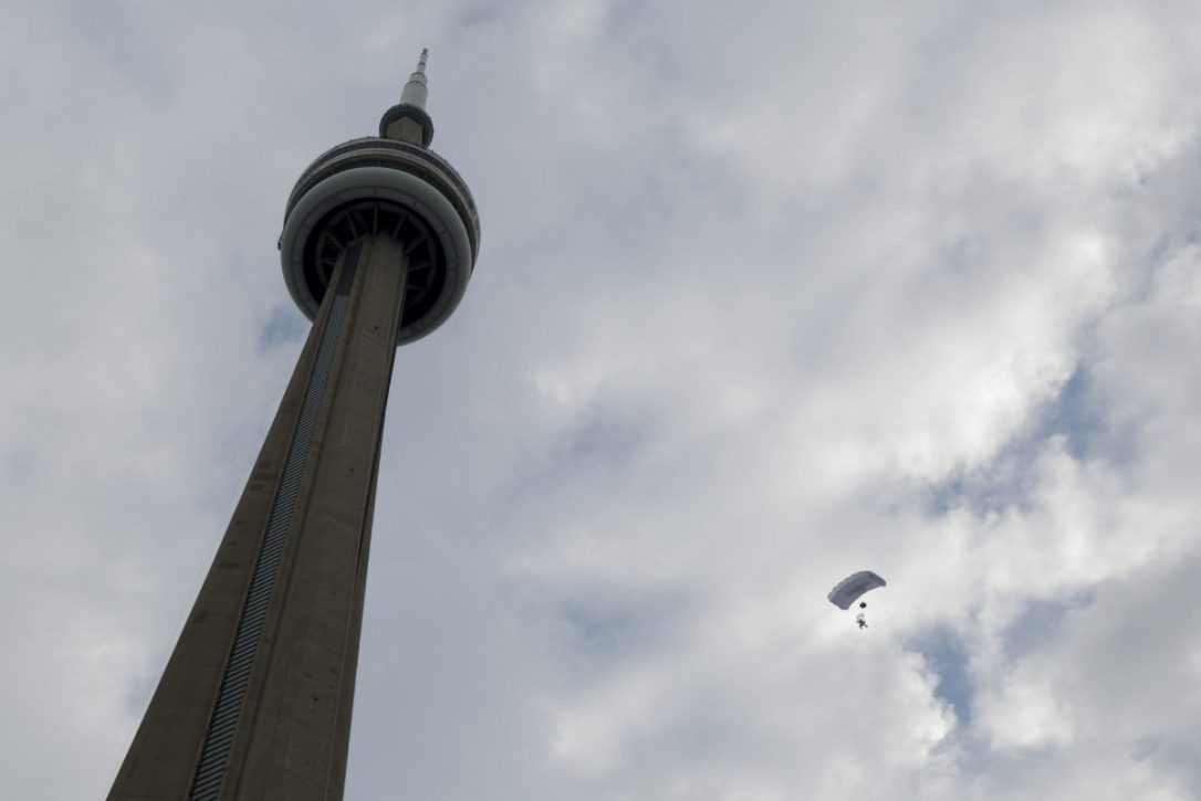The Jumper Floats To Earth After Free Falling From The CN Tower
